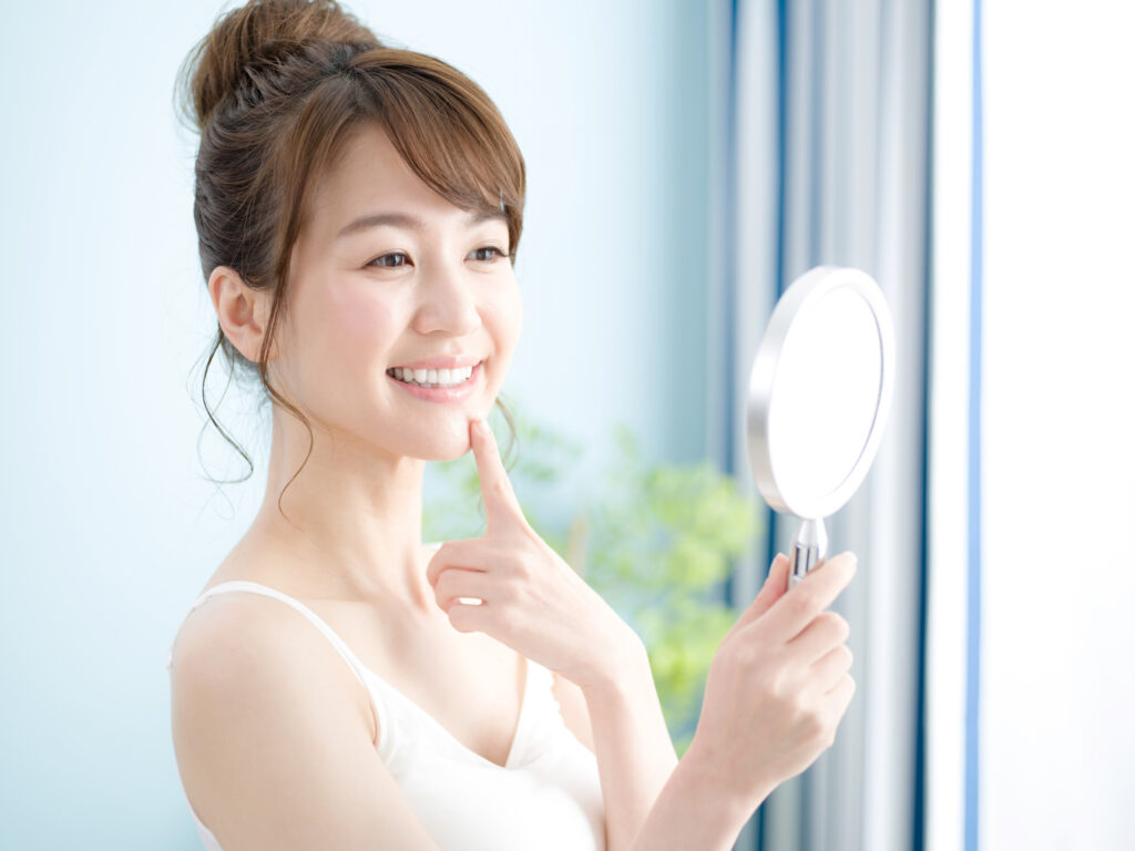 歯科医院で行うホワイトニングで効果が出た女性